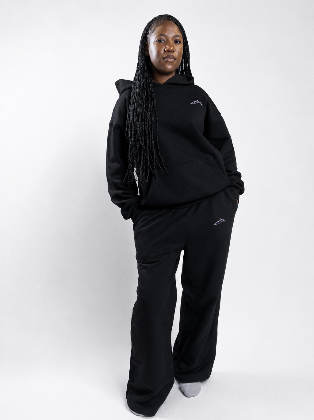 MÒN The Summit Sweatpants in black, full-body relaxed-fit view