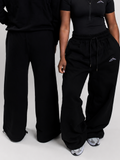 MÒN The Summit Sweatpants in black, hero shot with matching hoodie